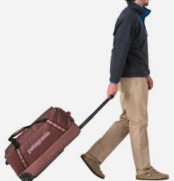 Black Hole Wheeled Duffel 70L Dulse Mauve